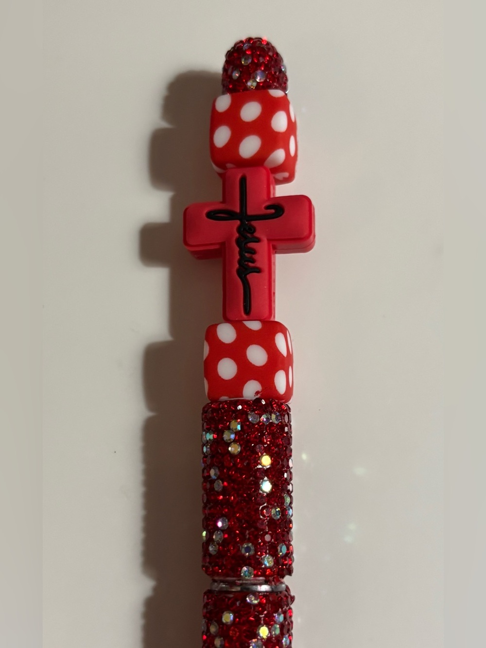 NIP Red Bead Pen with Cross Charm